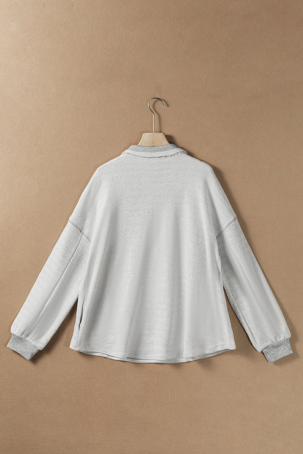 White Textured Side Pockets Buttoned Neckline Sweatshirt